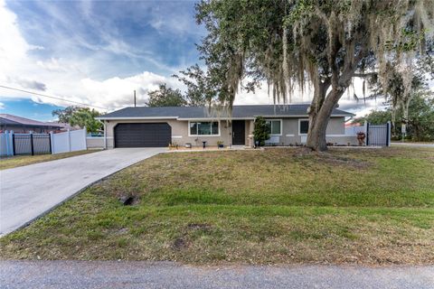 Photo of 824 Calvert Avenue NW, Port Charlotte, FL 33948 (MLS # C7518414)