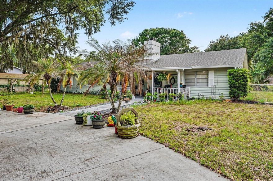 Experience the best of Florida country living on this impressive 2.47-acre estate in Davenport. This unique property features a well-maintained 1,888 sq. ft. home that offers the perfect blend of privacy and potential. Originally a 3-bedroom, the floor plan has been thoughtfully converted into a spacious 2-bedroom, 2-bath layout featuring a family room and a living room centered around a beautiful stone fireplace. The large kitchen provides abundant counter space and a separate dining area, ideal for gathering. Total kitchen remodeled was done in 2021,  Custom kitchen cabinets new appliances with granite counter top. Outdoor enthusiasts will love the expansive grounds, which include a private pond, a circular driveway, and a 1-car detached garage/workshop with electricity. The backyard is partially fenced for pets or play, and there is dedicated parking for your RV or boat. With NO HOA fees and a roof replaced in 2025, Gutter replaced in 2025 with custom leave guard, this property offers rare freedom and space just minutes from the ChampionsGate and Four Corners corridors. A peaceful rural retreat with quick access to I-4 and major attractions!