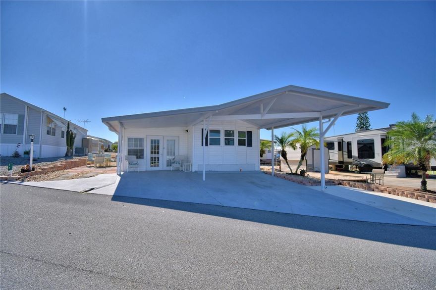 Seller is willing to pay ALL CLOSING COSTS for any buyer making a full price offer by Oct 1. Experience Florida living at its finest in the desirable 55+ gated community of West View Ridge—where you own the land! This FULLY FURNISHED 2 bedroom, 2 bath home is move-in ready and offers: Bright Florida Room with a spacious storage closet, Open kitchen with all appliances included and pantry for extra storage. There is an attached workshop/shed with Washer/Dryer. Low maintenance rock yard and patio area on side of home with table/chairs to relax and view the Western Sunsets. Enjoy resort-style community amenities including a solar-heated pool, recreation hall, mini putt-putt golf, shuffleboard, pickleball, bocce ball, and more. Conveniently located near restaurants, shopping, medical facilities, and major roadways providing easy access to Florida attractions and both the east and west coast beaches. Don’t miss your opportunity to enjoy the Florida lifestyle at West View Ridge. Seller is motivated!