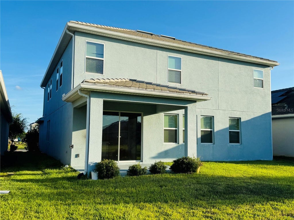 Photo of 12151 Imaginary Way, Orlando, FL 32832 (MLS # O6415010)