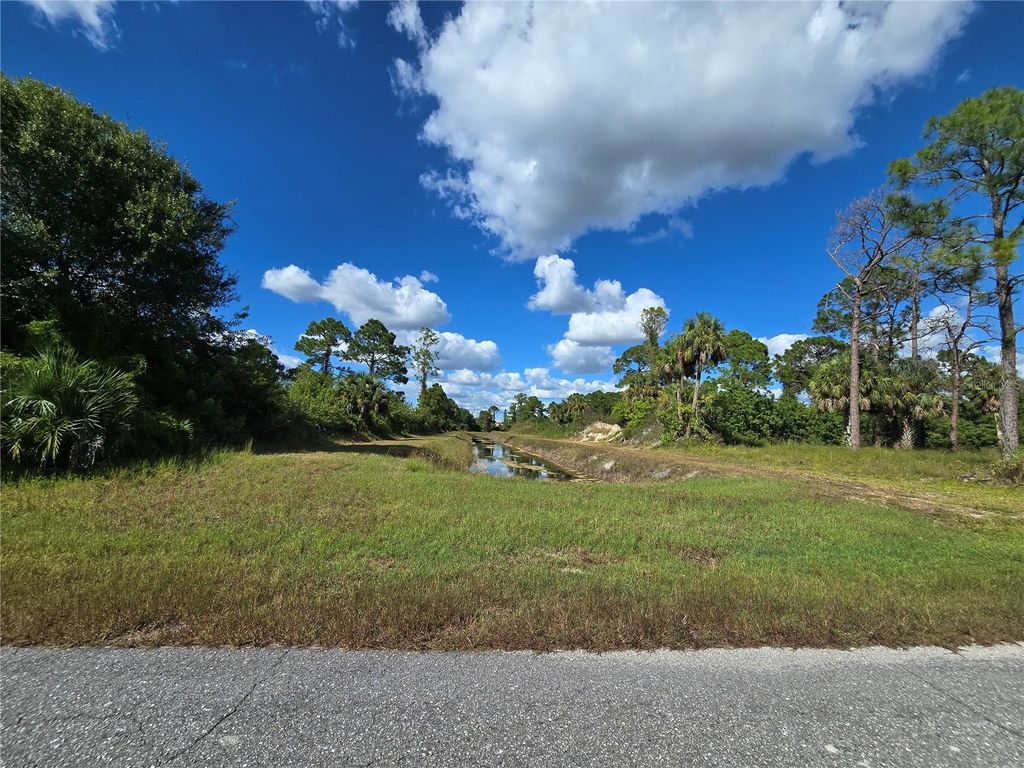 Photo of 419 Wilder Avenue S, Lehigh Acres, FL 33974 (MLS # O6354278)