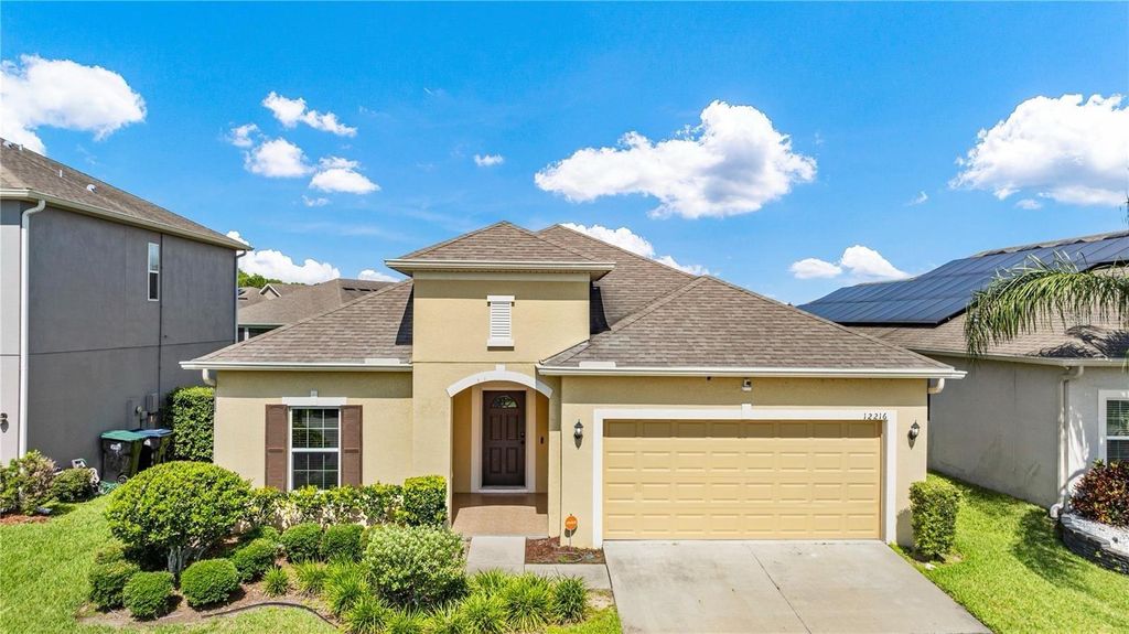 Photo of 12216 Prairie Plantation Way, Orlando, FL 32824 (MLS # O6395022)