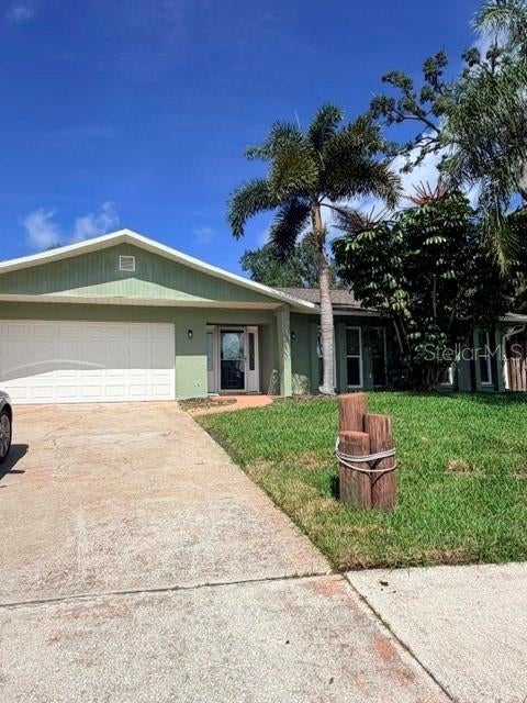 Photo of 527 Wayfarer Drive, Tarpon Springs, FL 34689 (MLS # TB8539206)
