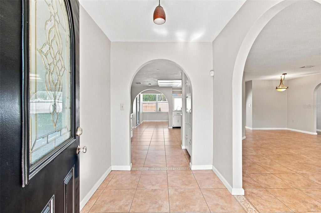 Photo of 527 Wayfarer Drive, Tarpon Springs, FL 34689 (MLS # TB8539206)