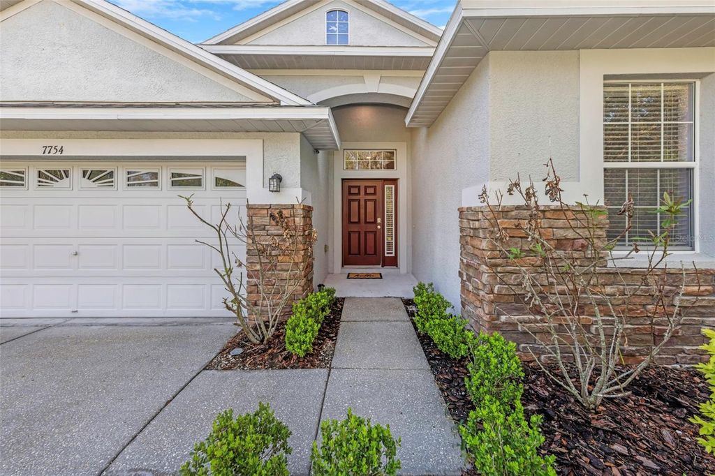 Photo of 7754 Stoneleigh Drive, Land O Lakes, FL 34637 (MLS # TB8485856)