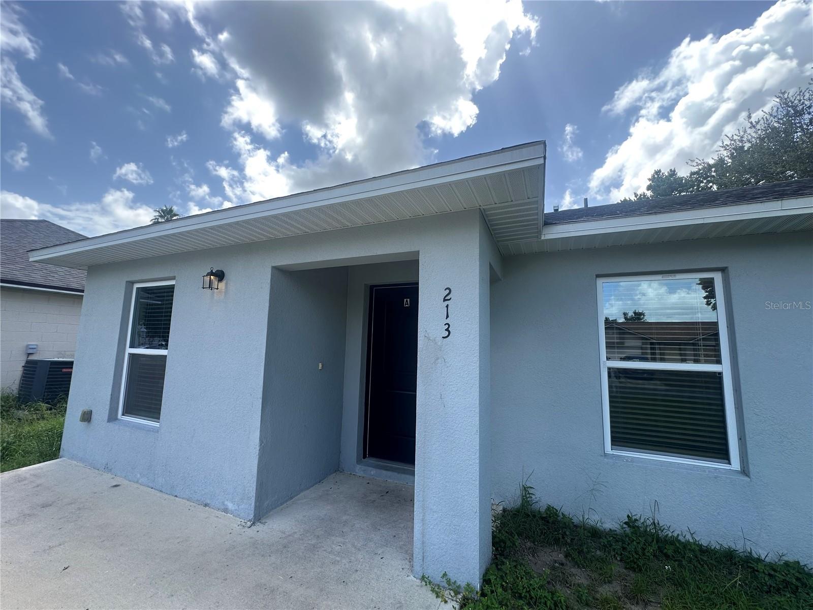 Welcome home to 213 Balboa Dr, Unit A in Kissimmee! This 3 bedroom, 2 bath duplex is just over 1,100 square feet. Upon entering, the first guest bedroom is to your right. Both additional bedrooms are well sized, with easy access to the second full bath. The primary bedroom is spacious, with private access to the primary bath and a walk in closet. The kitchen features a full suite of stainless steel appliances, including the refrigerator, range, over the range microwave, dishwasher as well as plenty of cabinetry and counter top space. Rounding out this home is the included washer and dryer and spacious backyard!