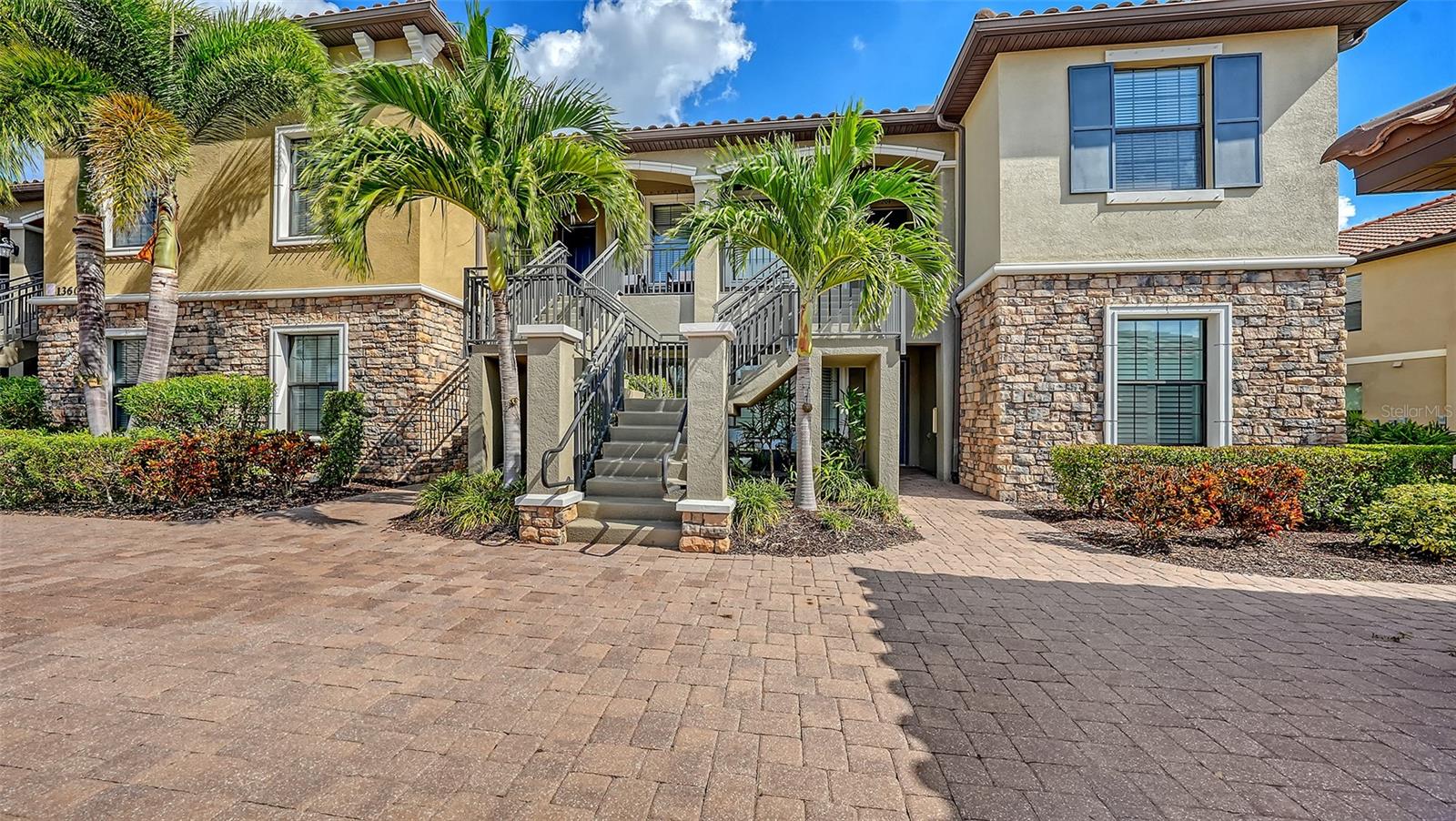 Esplanade Lakewood Ranch Golf and Country Club Gated community with 24 hour security guard. 2/2 + den ground floor condominium with golf membership transfer includes all amenities! Elegant and beautifully designed, highlighted by high ceilings with high end ceiling fans, faux wood paneled wall, recessed lighting and crown molding. Note the granite countertops in the kitchen with subway tile backsplash, motion activated under cabinet lights, and GE stainless steel appliances. Guest bedroom has a Queen sized bed and the Primary bedroom has a King.
Your vacation is off to a great start at Esplanade: 18-hole championship golf course, pickleball, bocce ball, numerous pools and spas, pool side tiki bar, aerobics, fitness classes, and weight room, fine dining on site, a bistro and a tap room. Many dining and entertainment options nearby including Lakewood Ranch Main Street, Waterside Place and UTC Mall.