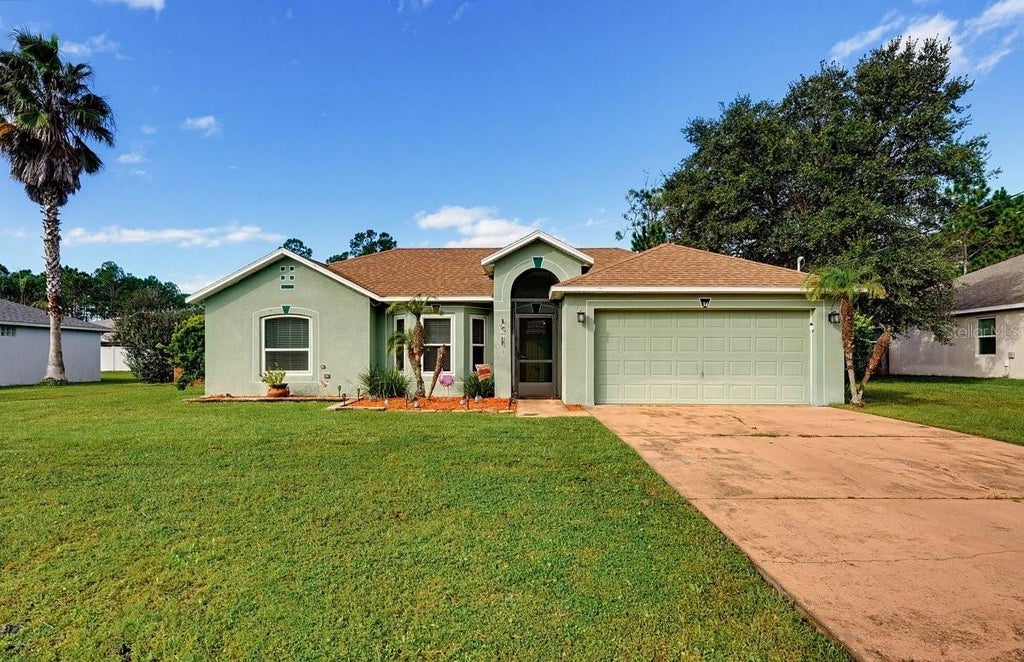 Photo of 34 Seathorn Path, Palm Coast, FL 32164 (MLS # NS1089594)