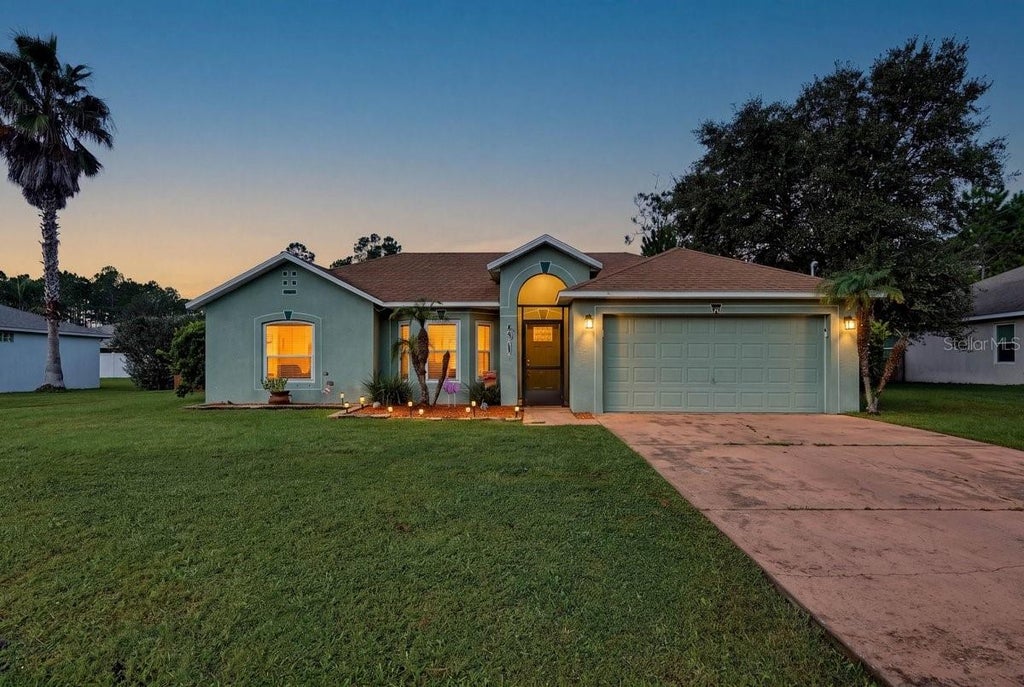 Photo of 34 Seathorn Path, Palm Coast, FL 32164 (MLS # NS1089594)