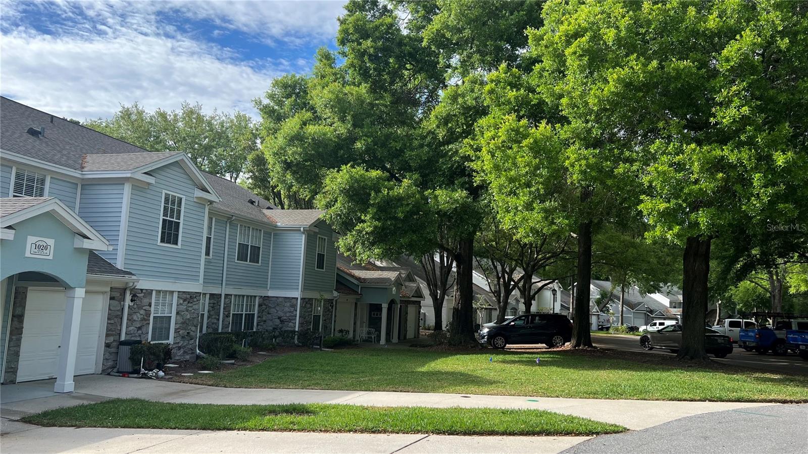 One or more photo(s) has been virtually staged. A lovely community....trees, trees, trees. Winding streets. Quiet enjoyment. This condo has been updated and is clean and move in ready. The public area is open and spacious with high ceilings and a screened porch/balcony. The kitchen is open to the Great room, has stainless and black appliance, Quartz counters, marble backsplash, under cabinet lighting and an island. Luxury vinyl flooring throughout makes for easy housekeeping. The condo offers a large panty/storage area and a separate laundry room with cabinets. As an extra this unit has attic access for additional storage. Enjoy a single car garage with a new garage door opener. The condo fee includes WIFI, cable, water, and trash collection, exterior pest control, roof, exterior maintenance, escrow reserve, exterior insurance, community property manager, cabana and community pool. Call your agent to view today!