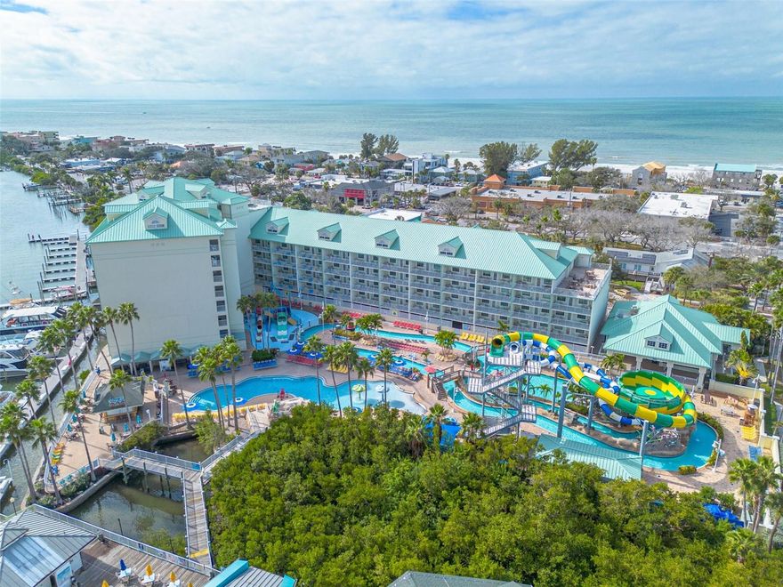 Experience a truly unique destination: a fabulous Gulf-side water park community featuring a lazy river, heated pool and spa, and a lively Tiki bar just steps from your door. Owners and guests can enjoy all of this plus a short walk across the street to the powdery white sands of Indian Rocks Beach. This rare, direct waterfront unit overlooks the serene Intracoastal Waterway in a designated No Wake zone. Residents also have access to the 6th- and 7th-floor rooftop sundecks—perfect for taking in stunning Gulf and Intracoastal views and unwinding with a glass of wine while watching spectacular sunsets. This pet-friendly, amenity-rich complex has something for all ages, making it ideal as both an investment property and a vacation retreat. The turnkey condo comes fully furnished and is ready for short-term rentals from day one (3-night minimum, 120-day maximum). It features a split floor plan, well-sized bedrooms, and an open kitchen with a breakfast bar. A gift shop and a highly rated seafood restaurant are conveniently located within the complex.