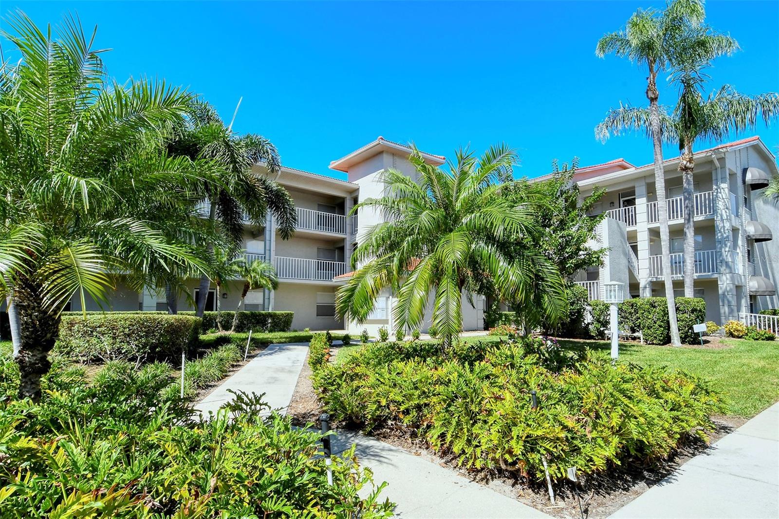 Great Condo Home right on the corner of the Lake and brand new 1st Green and 2nd tee complex. Views of the Golf action and lake are pristine! Turnkey Furnished unit with Laminate Floors throughout the living spaces and carpet in the bedrooms. Open Floor plan featuring Stainless Steel appliances and eating space in kitchen. Primary bedroom has slider out to lanai and a walk-in closet. Guest quarters and 2nd bedroom is in the front of the unit. Great unit for vacation rental or personal use. Carport and additional parking for Guests and individual Storage Closet for the Owners. Community pool nearby and Pickleball/Tennis court to enjoy. Condo Building as a newer tile roof and recent updated paint. Gathering areas as well to meet your neighbors.  A premier member-owned country club, Stoneybrook of Sarasota, is only a short distance from Siesta Key and offers easy access to shopping and borders the Legacy Trail. Ownership in Stoneybrook Golf and Country Club includes an updated clubhouse and restaurant, Har-Tru tennis facility, well-equipped fitness center and additional club pool and spa. Nestled between Downtown Sarasota and Downtown Venice. In 2024, the Golf Course went through a complete redesign and is now complete and open to the members! Assessment is paid in full!