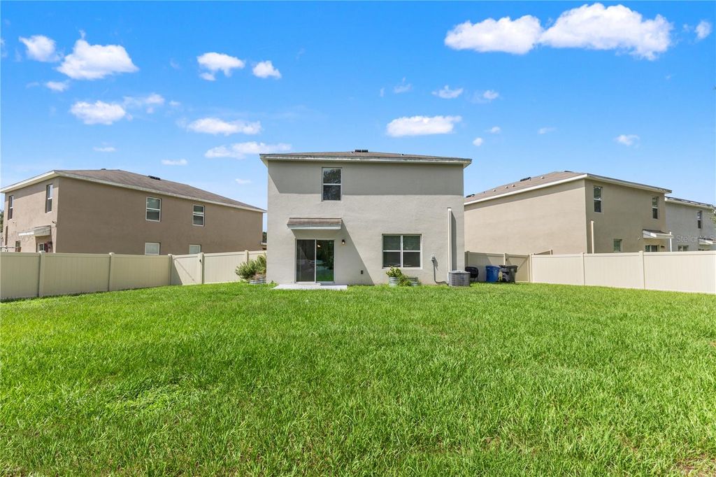 Photo of 10823 Trailing Vine Drive, Tampa, FL 33610 (MLS # TB8527750)