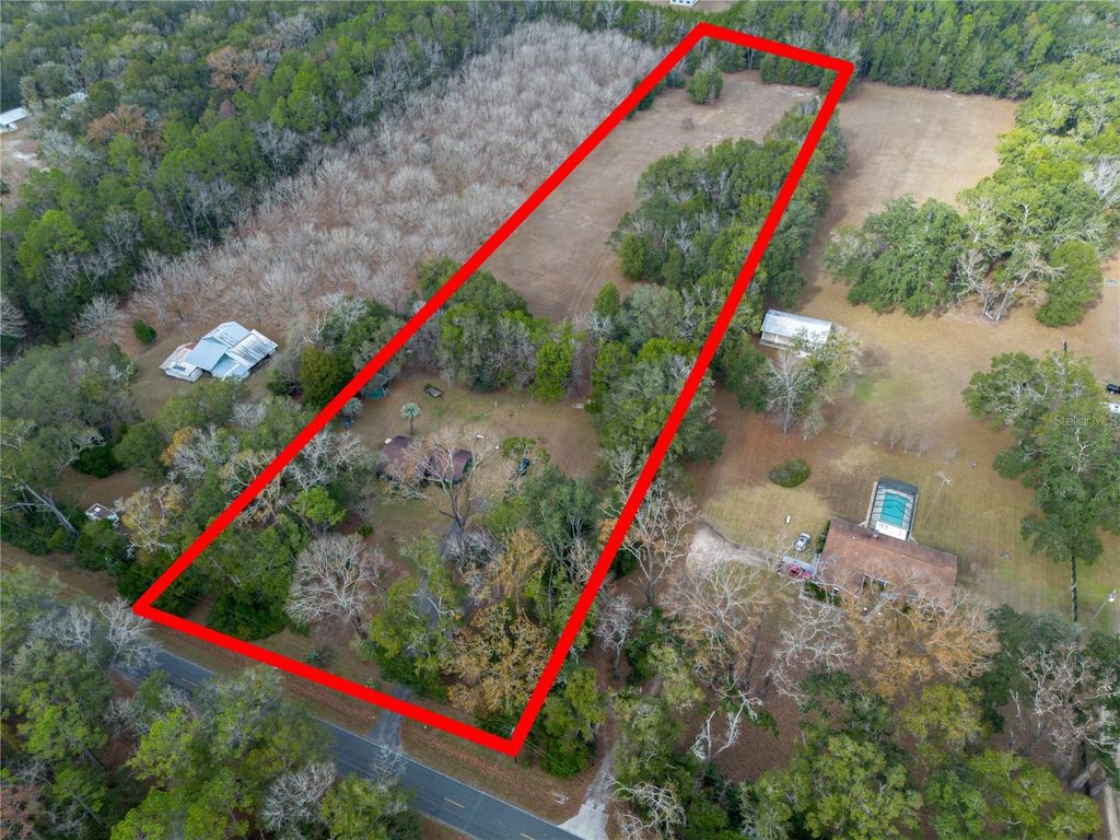 Photo of 20710 NW County Road 2054, Alachua, FL 32615 (MLS # GC536115)