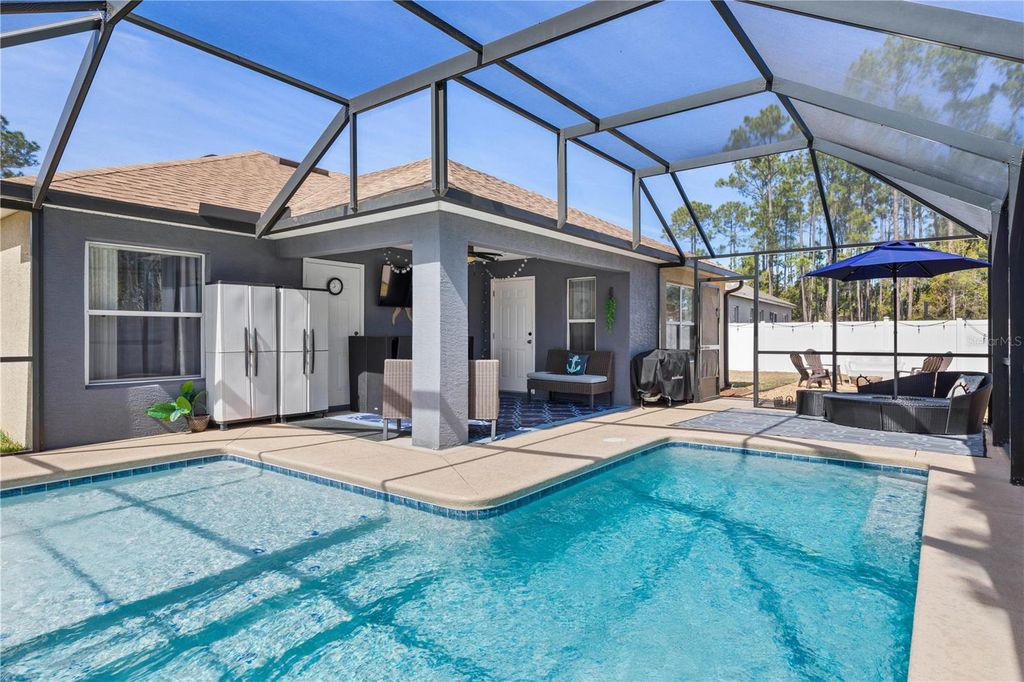 Photo of 67 Raintree Place, Palm Coast, FL 32164 (MLS # FC316447)