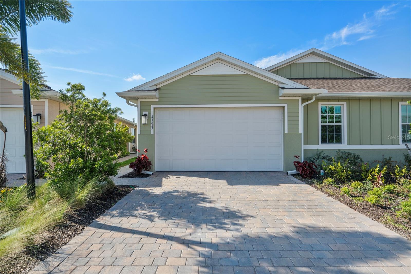 This unfurnished villa available October 1st for annual lease, offers the perfect opportunity to live in one of the most desirable neighborhoods at Babcock Ranch, blending modern amenities with a lifestyle in harmony with nature. With 2 bedrooms, 2 bathrooms, and a versatile enclosed den that can serve as a home office or guest room. The open-concept floor plan connects the living, dining, and kitchen areas, making it perfect for entertaining or everyday living. The kitchen stands out with white cabinetry, quartz countertops, a custom backsplash, and stainless steel appliances, creating a modern yet inviting space. The split bedroom layout provides privacy, while hurricane-impact windows and sliders ensure peace of mind. Step outside to a screened lanai overlooking a fenced yard with a tranquil water view, perfect for relaxing evenings or weekend gatherings. A two-car garage offers convenience and extra storage. Residents of The Preserve enjoy their own private neighborhood pool, while the larger Babcock Ranch community offers miles of scenic trails, parks, lakes, and a vibrant calendar of events. Known as America’s first solar-powered town, Babcock Ranch is built around sustainability, walkability, and a true sense of community. Recently opened shopping, dining, and entertainment options add to the appeal, placing everything you need just minutes from your front door.