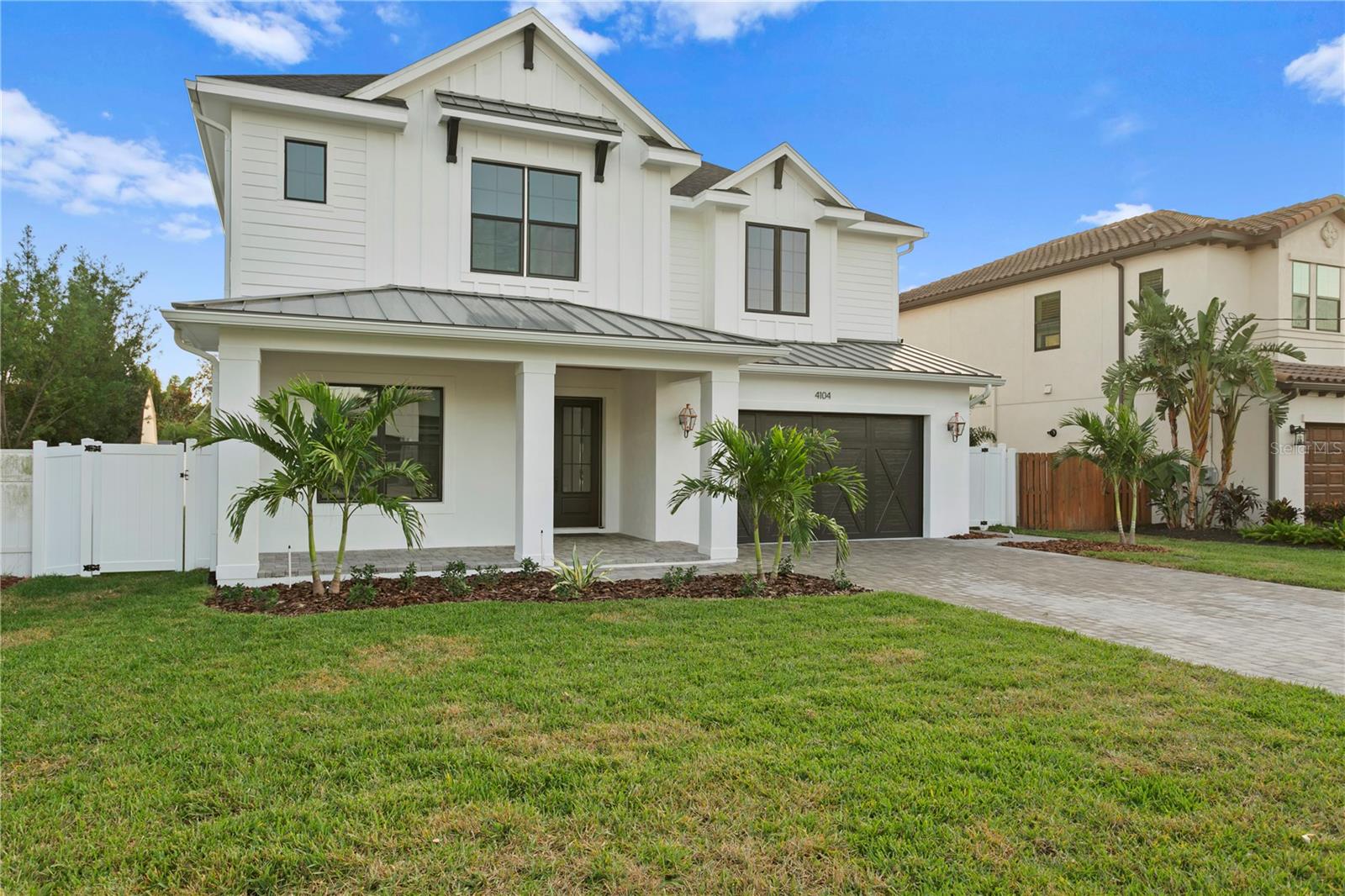 Under Construction. Charming TB Homes Farmhouse, ESTIMATED to be move-in ready April 3rd 2025. Situated within the Swann Estates neighborhood on a 75x138 lot (ENORMOUS 24' Side Yard & an EXTRA 18' of Yard BEHIND POOL). Just a quick 10 minutes +/- to Downtown Tampa/Hyde Park Village/Soho. A-rated school district - Grady/Coleman/Plant! Superior construction; 2 story block, spray foam insulation, smooth drywall, white oak wide plank wood floors throughout, RH lighting, solid core doors, 7" cove molding, stained tongue & groove coffered ceiling details make for a unique aesthetic. This special home includes 5 bedrooms, one of which is located on the 1st floor with en-suite bathroom. The kitchen is finished w/white shaker cabinets stacked to the ceiling, custom designed stained wood range hood, large stained wood island w/Kohler farm sink, Sub- zero/Wolf appliances, quartz counters & brushed gold fixtures and hardware. Additional rooms include; mudroom (w/bench & cubbies), breakfast nook, butler's pantry (w/wine fridge), dining room, office, 1st floor powder bathroom, gym, laundry room & media room (w/kitchenette & a 2nd powder bathroom). Silver travertine laid in a French pattern adorn the covered lanai/pool deck. The saltwater/heated pool includes a sun shelf & a 6' x 12' semi submerged spa. Incredible 30' lanai w/Outdoor Kitchen. Photos are from previously built homes and may show differences to landscaping/finishes/features/upgrade/layouts. Rendered floor plans & pool plan are for artistic purposes only. Nothing herein should be relied upon for accuracy. Please request a copy of the detail spec sheet and look book. The home has wood, tile & cabinets installed!