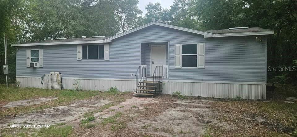 Three bedroom, two bathroom home, with a large kitchen and plenty of cabinet space and counter space. Large master bedroom! Large laundry/utility room off kitchen. Open dining and living room. Gives a nice open feel to the floorplan. Right across from the beautiful Deer Back lake. Home and Land. NO HOA. Land included. 1521 sqft. 3 bed. 2 bath. New Paint. Central AC. New Carpet. well and septic