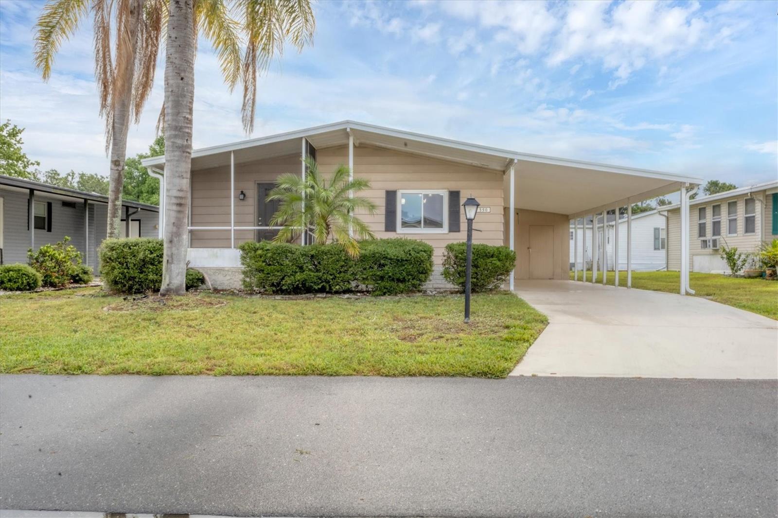 Welcome to your own little peace of paradise. This move in ready home is waiting for you to make it your own. Shadow Brook is one of the best kept secrets in Manatee county. You own the land which means NO LOT RENT. The low quarterly fee includes Water, Sewer, Cable and Internet. It is a any age pet friendly park. This beautiful house has been totally updated on the inside.There is laminate and vinyl flooring throughout the house. New Ac and HVAC was installed in August of 2022. A Reroof was put on in March 2013. Shadow Brook features a beautiful heated pool and shuffle board courts. The clubhouse has a large library and a pool table. You can rent out the clubhouse for special events. Shadow Brook is located near the Sunshine Skyway Bridge and I 75. The beautiful gulf beaches of Anna Maria Island are just a short drive away. All room sizes are approximate. Please use As Is contract.