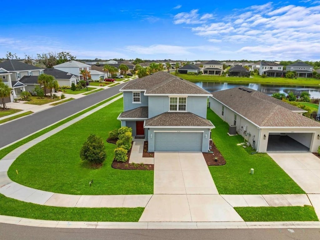 Photo of 6365 Springmont Loop, Palmetto, FL 34221 (MLS # A4698690)