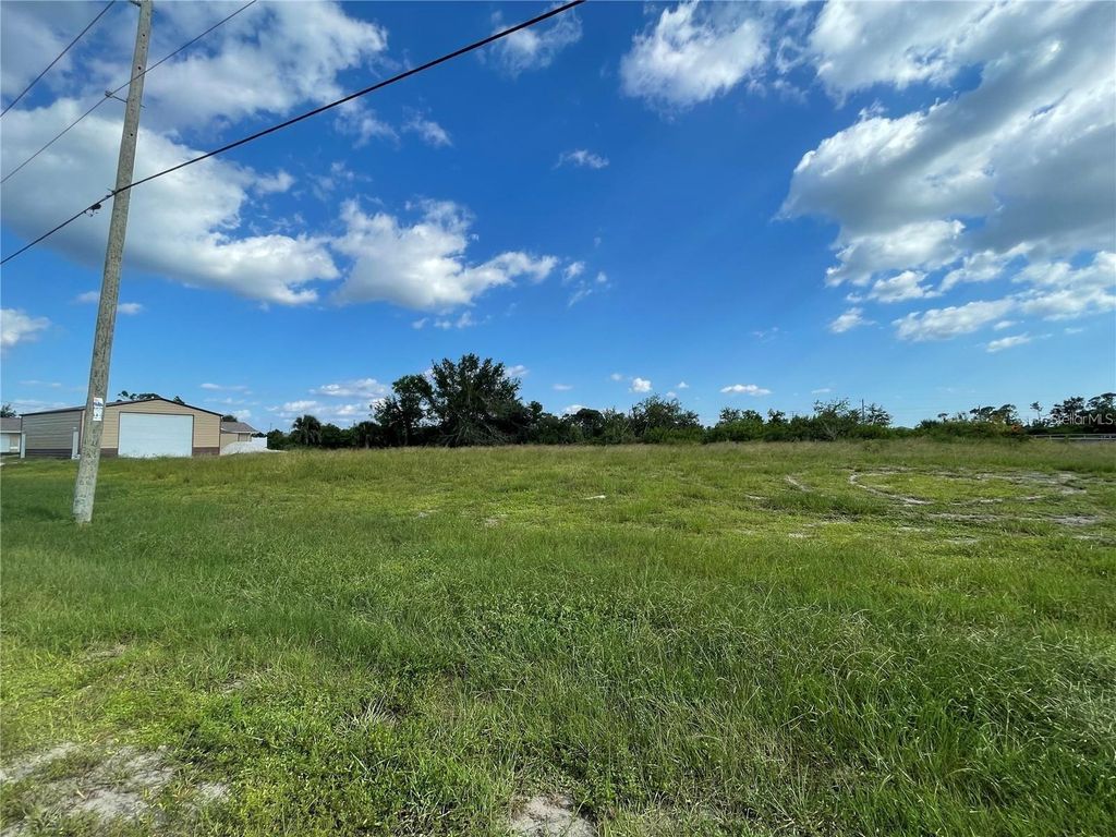 Photo of 12743 Foresman Blvd, Port Charlotte, FL 33981 (MLS # TB8484247)