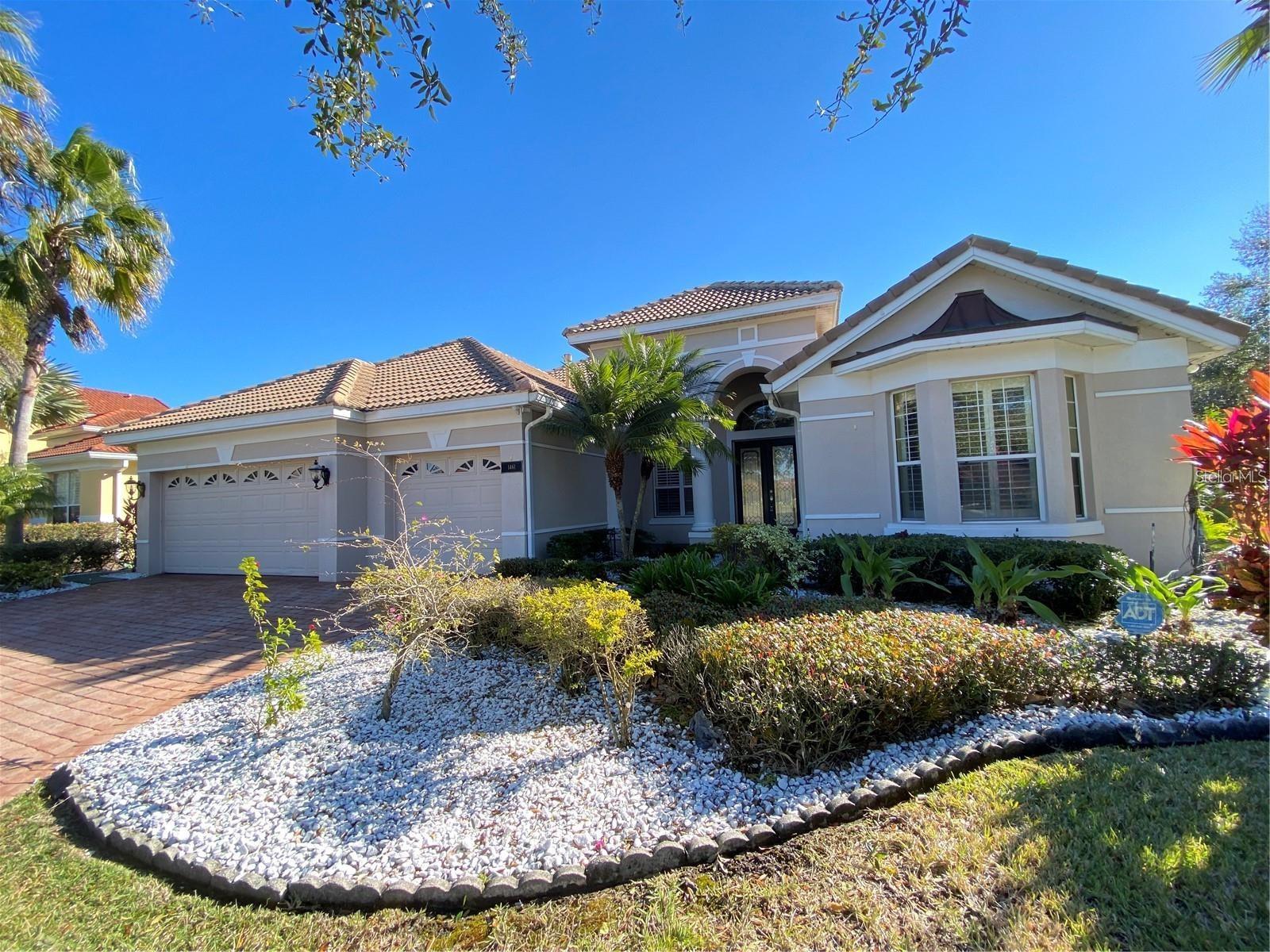 WINDERMERE GEM RENTAL | Welcome to the luxurious 24 hr guard gated community of Reserve at Belmere. This enchanting 4 bedroom/3 bathroom home has to be seen with your own eyes. Enjoy an open/split floor plan suited perfectly for any family. Enjoy the grand outdoor living space which features a very large pool and oversized jacuzzi with child safety fence and fully screened enclosed plus a full size basketball court. The kitchen has stainless steel appliances including a brand new cooktop. The beautiful beveled glass double front doors lead to the thoroughly modern yet comfortable living and dining room areas featuring uniquely finished wood flooring. This mesmerizing home has many added features from the recently upgraded beautiful landscape, newly painted private basketball court, gas heated spacious screened executive pool, to the Beautiful pond views from the house with breathtaking vistas, especially at sunset. Some added interior features include newer carpets in the bedrooms, custom designed closets in all bedrooms, and the windows have plantation shutters. It is an extremely private home with one of the largest corner lots in the community with mature trees, several fruit and flower trees. Perfect setting for nature lovers with plenty of opportunities for gardening. plus ample outdoor space for entertainment purposes. The Reserve at Belmere is a luxurious community with access to a clubhouse and gym. Landlord provides pool care, insect care, and landscaping services for your convenience. Enjoy the conveniences to the Windermere lifestyle, plus just minutes away from all of the Disney/Universal/Sea World Theme Parks. Schedule showing now as this will not last at this price!