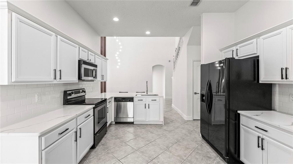 Photo of 2165 The Oaks Boulevard, Kissimmee, FL 34746 (MLS # O6410216)