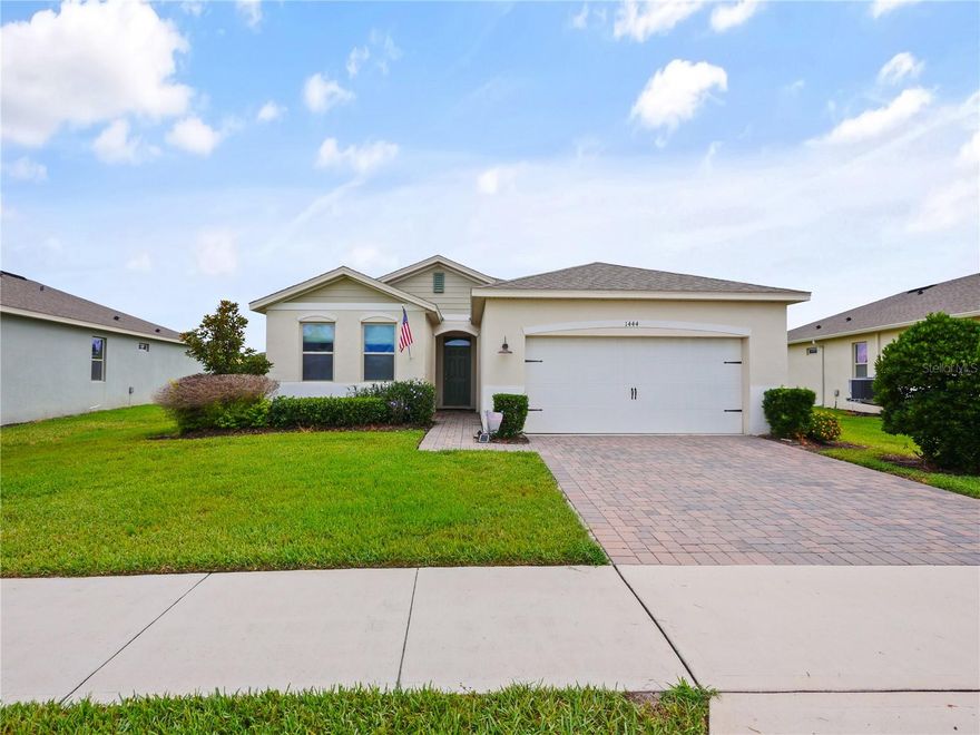 Welcome to 1444 Hopedale Place, a beautifully maintained 3-bedroom, 2-bathroom home in the gated Rosecrest community of Sanford. Situated on an oversized pond-front homesite, this home offers peaceful water views and a low maintenance lifestyle with lawn care, shrub pruning, and irrigation maintained by the HOA.

Inside, you'll find an open-concept floor plan designed for both everyday living and entertaining. The kitchen features quartz countertops, stainless steel appliances, and overlooks the dining and living areas, creating a seamless flow throughout the main living space. Ceramic tile flooring extends through the primary living areas, while 8-foot interior doors add to the home's spacious feel.

The primary suite offers a generous walk-in closet and an en-suite bathroom with dual vanities. Recent upgrades provide added value and peace of mind, including a new HVAC system installed in 2025, a whole-house surge protector, a premium custom shower renovation, ADT security system, fiber-optic internet, smart garage door controls, and smart home technology throughout.

Enjoy relaxing on the covered paver lanai overlooking the pond, where you can take in the natural beauty and wildlife right from your backyard. Located just two doors from the community pool and mailbox, residents also enjoy gated access and a community cabana. Rosecrest offers convenient access to Historic Downtown Sanford, Lake Mary, Orlando Sanford International Airport, Orlando International Airport, major highways, shopping, dining, and everyday conveniences.

If you have been searching for a move-in ready home with water views, modern upgrades, smart home features, and a prime Seminole County location, 1444 Hopedale Place deserves a spot at the top of your list.