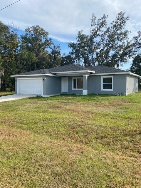 Photo of 40 Maple Lane, Ocklawaha, FL 32179 (MLS # O6371452)