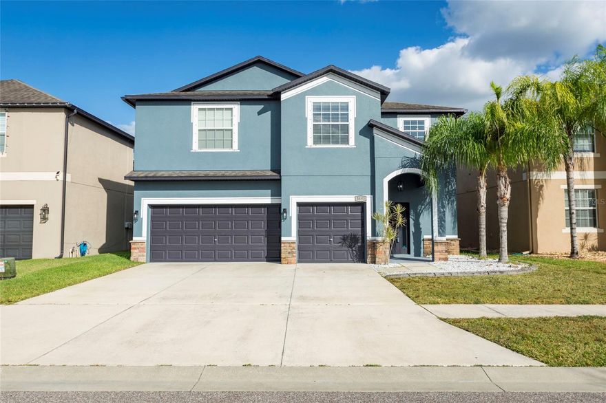 **RECENT PRICE IMPROVEMENT** 
Get ready to fall in love! This meticulously maintained pool home in Concord Station is a rare gem that won't last long. With 6 bedrooms, there are endless possibilities for creating your own gym, movie room, or home office space. The home features recently painted interiors and exteriors with ceramic wood tiles downstairs for maximum durability. The luxury chef's kitchen boasts quartz countertops with a glass backsplash, high-end cabinetry, and premium appliances. The living room features an open floor plan with an amazing stonework accent wall that is sure to impress. When you step outside, you are greeted by an outdoor kitchen that makes entertaining easy beside your luxurious, yet low-maintenance, heated saltwater pool with two waterfalls for year-round enjoyment. The first-floor also features a guest bedroom that has access to a fully upgraded bath with granite countertops, and there's a 3-car garage for all your parking and storage needs. Upstairs, you'll find a loft/sitting area centered between 5 large bedrooms and 3 full bathrooms. The spacious primary bedroom has its own sitting area and comes complete with an ensuite luxury bath that has both a relaxing soaking tub and a walk-in shower. The enormous walk-in closet has ample space and includes custom shelving. The Concord Station community features top-of-the-line amenities, including a 5,000 sq ft clubhouse, fitness center, game room, resort-style pool with splash zone, parks, walking and biking trails, playground, basketball, and tennis courts. This breathtaking home and impressive community truly have it all! Located in a prime spot, you can enjoy easy access to shopping, dining, and great schools. Don't miss out on this amazing opportunity. Schedule your showing or personal tour today!