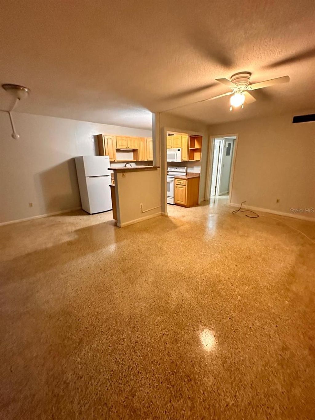 Photo of 305 E Dakin Avenue #11, Kissimmee, FL 34741 (MLS # O6418236)