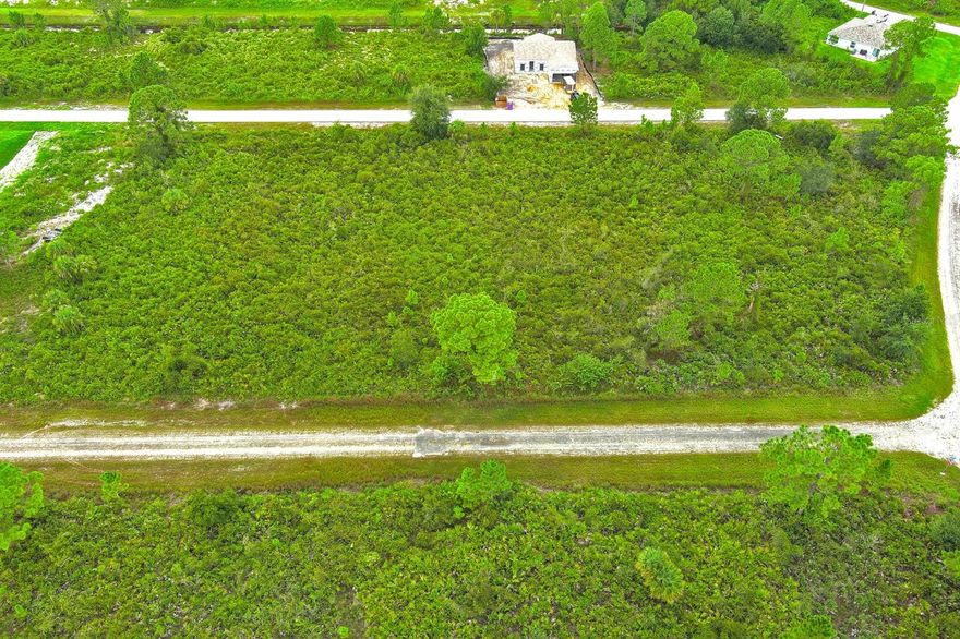 This prime 0.25-acre residential lot on the east side of Lehigh Acres is ready for development. With no neighboring properties and located in a high and dry area outside any flood zone, this lot offers the perfect opportunity for a peaceful and secure build.