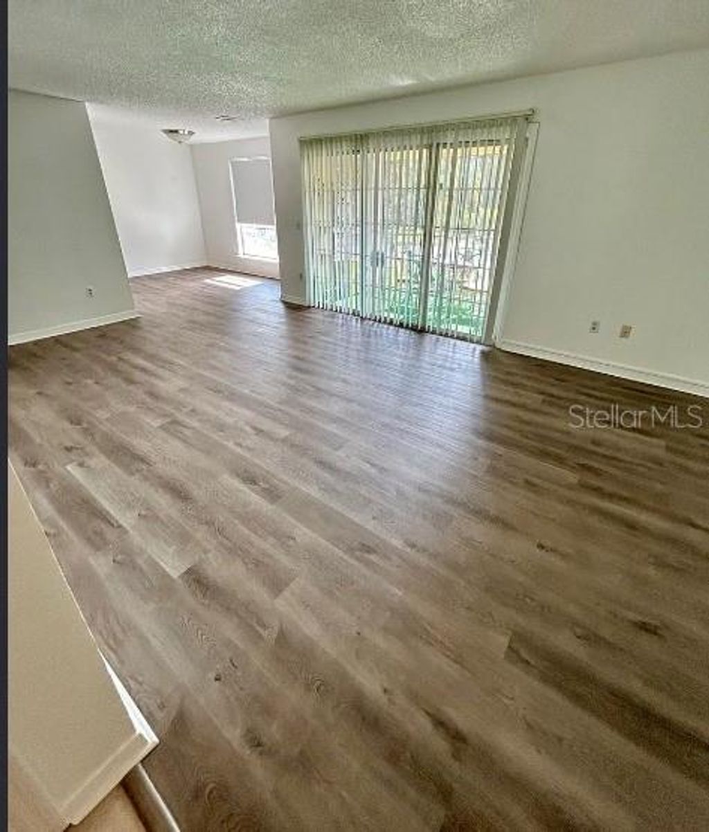 Photo of 4114 Dijon Drive #4114E, Orlando, FL 32808 (MLS # O6387870)