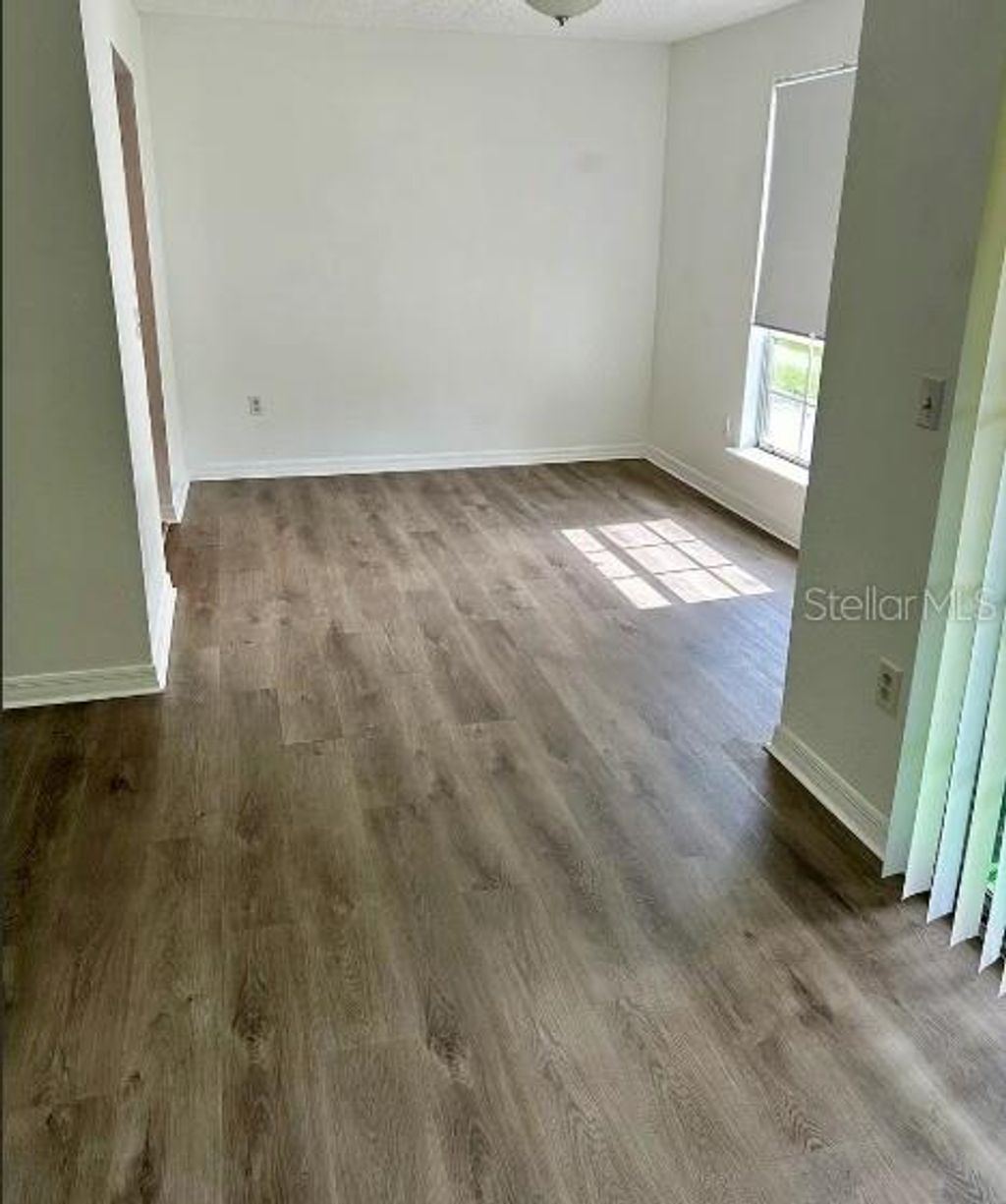 Photo of 4114 Dijon Drive #4114E, Orlando, FL 32808 (MLS # O6387870)