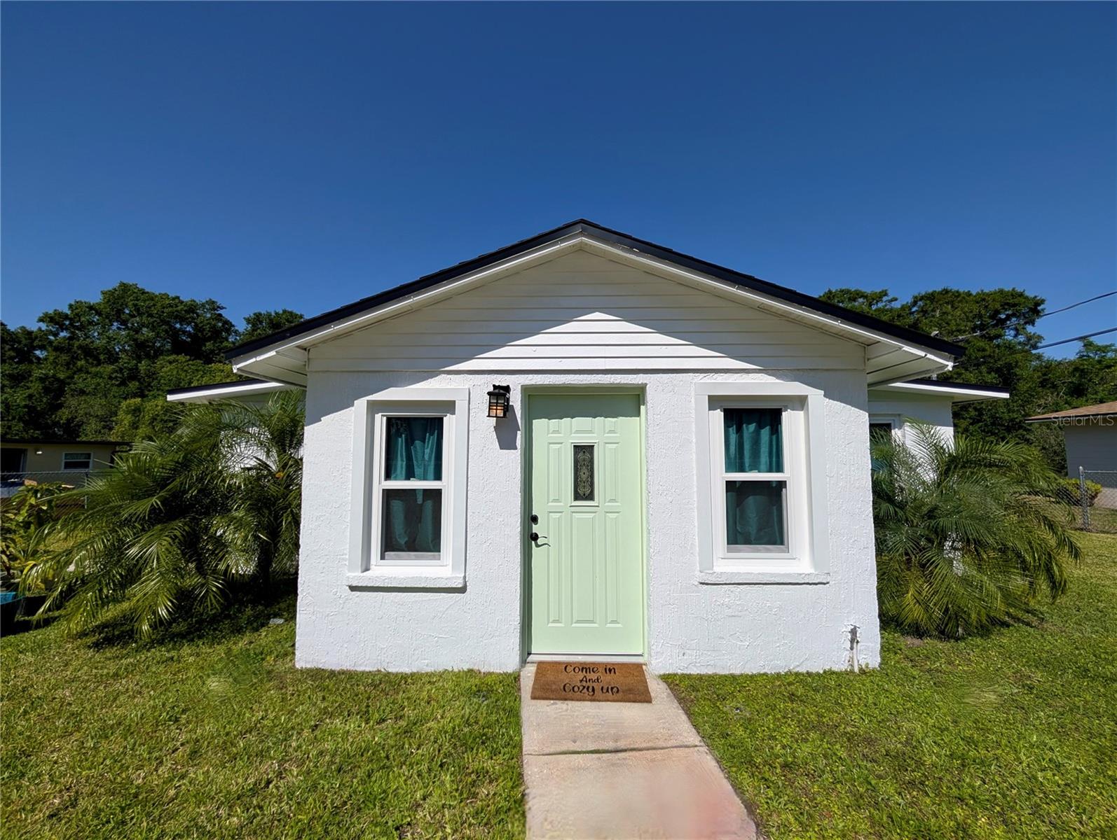 Welcome home! This 4-bedroom, 1-bath Lakeland charmer checks all the right boxes—and even a few you didn’t know you wanted. Roof and windows were replaced in 2021. The front yard irrigation system keeps your lawn looking sharp. Fresh paint inside and out means you can move right in and start enjoying! NO HOA - NO CDD - Not in flooding zone.
Inside, you’ll find a winning combo of newer carpet for cozy vibes and tile in the kitchen and bathroom where it matters most. The fully fenced backyard faces west, giving you front-row seats to Lakeland’s colorful sunsets.
Love the outdoors? Holloway Park’s 300+ acres of trails and nature are just minutes away. Excellent Location, close to downtown Lakeland, hospitals, shopping, and restaurants, plus only 2 minutes to the Polk Parkway with quick access to Tampa and Orlando. Schedule your private showing today.
This home blends comfort, updates, and a little fun—don’t wait too long, or someone else will be enjoying those sunsets instead of you!
Some photos have been virtually staged. Measurements are approximately, buyer/s or buyers agent should verify