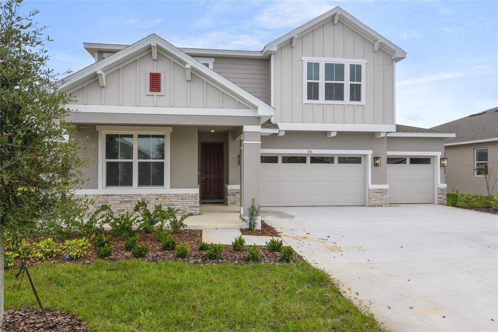 Photo of 158 Waterstone Loop, Tavares, FL 32778 (MLS # S5131861)