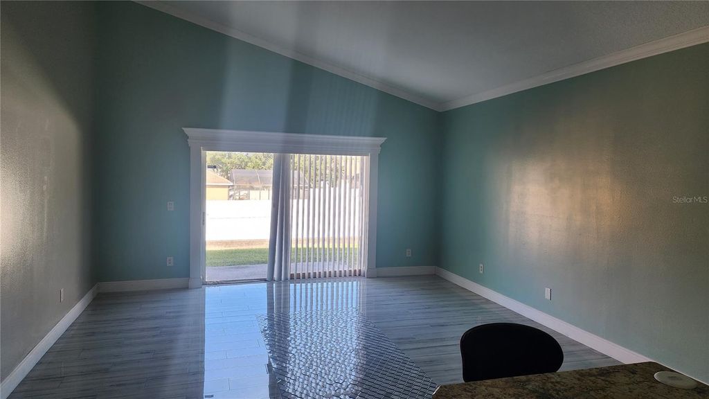 Photo of 7809 Rex Hill Trail, Orlando, FL 32818 (MLS # O6396409)