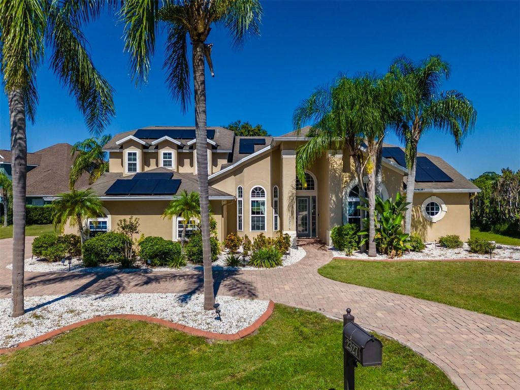 Photo of 2327 Camp Indianhead Road, Land O Lakes, FL 34639 (MLS # TB8437277)