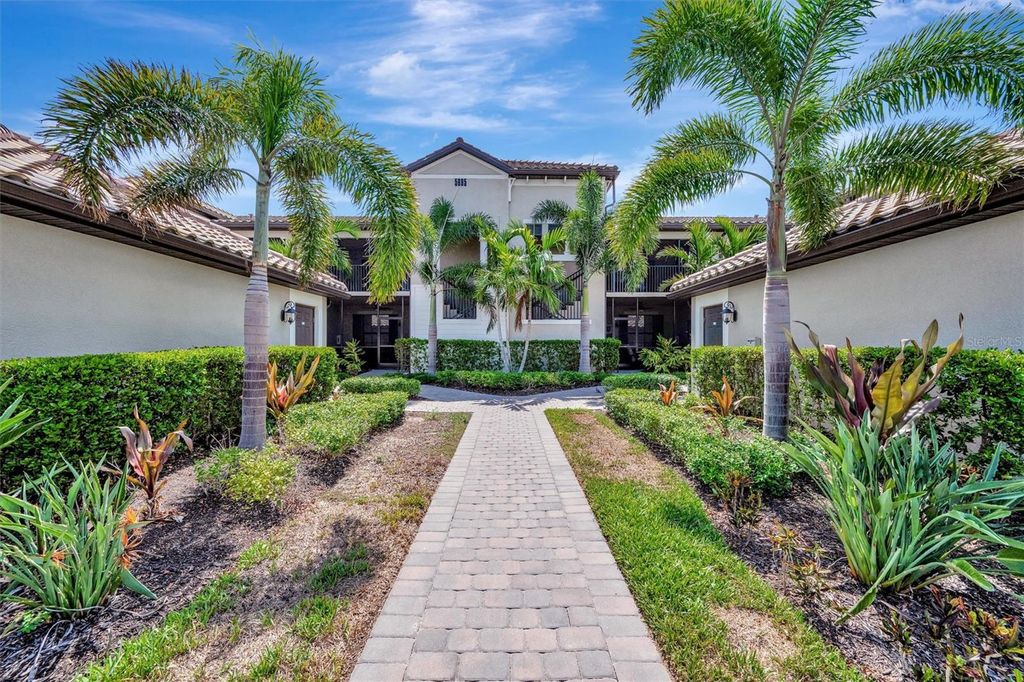 Photo of 5695 Palmer Circle #203, Bradenton, FL 34211 (MLS # A4655071)
