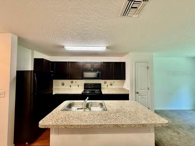 Photo of 707 W Chelsea Street, Deland, FL 32720 (MLS # V4951215)