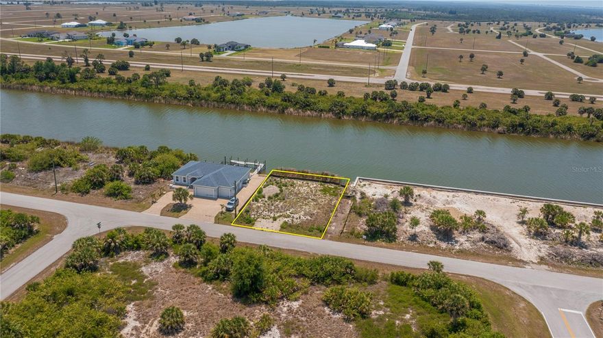 DISCOVER YOUR PERFECT SAILBOAT LOT with NO BRIDGES and UNOBSTRUCTED stunning water views along the Santa Cruz waterway!  Public water and public sewer with an optional low yearly HOA  this fantastic property is perfectly positioned directly across from a pristine SERENE preserve so your breathtaking water view is guaranteed forever. ***WOW***This location is an absolute BOATER'S DREAM, offering direct, effortless access to the Gulf of America, nearby islands, and the gorgeous Southwest Florida beaches.

All utilities are conveniently close, making this lot READY for your dream home build! Experience tropical paradise living at a fraction of the cost, just minutes away from the charming Boca Grande, Little Gasparilla, Useppa Island, Cabbage Key, and the spectacular Stump Pass.

South Gulf Cove community amenities include a Boat Ramp, nearby marinas, expansive parks, and playgrounds—perfect for family fun and outdoor adventures and are OPTIONAL HOA. Enjoy close proximity to fantastic dining, shopping, world-class fishing, top golf courses, and so much more—all just minutes from your future doorstep.

This is an incredible investment opportunity—build now or later, but don’t wait to bring your boat and create your very own private waterfront oasis!

Experience the ultimate Florida lifestyle—your beautiful waterfront lot with direct Gulf access awaits!