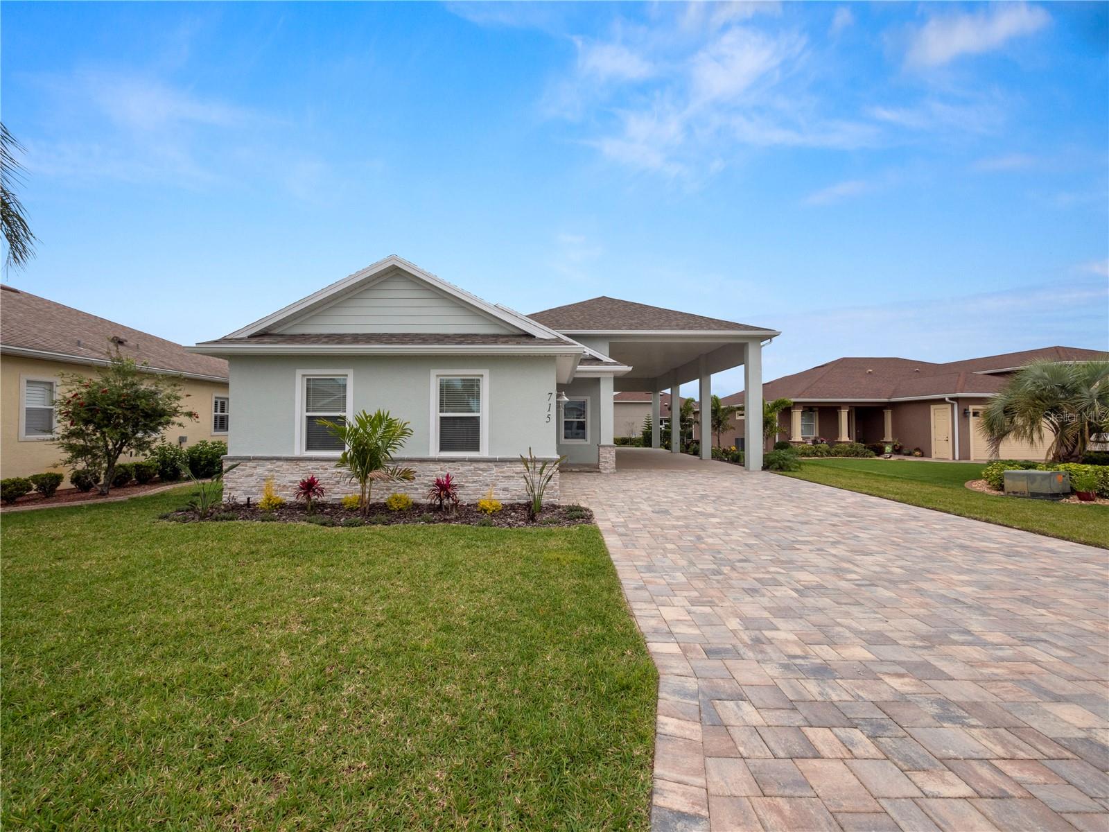 This brand new construction home is something to see. Located in the sought after community of Mt. Olive Shores North an RV community. Why wait for a year to build when you can move right in. The home offers 2 bedrooms/2 bathrooms plus an office/flex room. An open living room and kitchen area compliment the sleek look. The primary bedroom has a beautiful walk in shower and double sinks. The closet will have custom cabinets installed before occupancy. The RV port measures 16X55 which is perfect for any size motorhome. Plenty of seating in the front and back of the house for those relaxing evenings. The community boasts two clubhouses with pools and many amenities throughout the year. Call for an appointment to see this beautiful home.