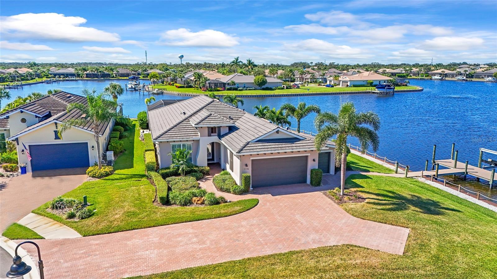 Welcome home to your waterfront paradise in the sought after community of Tidewater Preserve. This 4 bedroom, 2.5 bath pool home is situated on 180 degrees of waterfront views and breathtaking sunsets. This home is set for boaters to include a 20,000lb boat lift and additional garage storage. The recently added oversize outdoor space allows for waterfront entertaining and cooking while relaxing in your heated pool and spa or lounging by the firepit. Interior features of this natural gas community include whole house generator, ceramic tile throughout, plantation shutters throughout, custom closet and pantry, storm smart screen on lanai and more. This particular lot offers the boat lock system allowing for easy access to all waterways. Tidewater Preserve amenities include a marina, tennis courts, dog parks, state of the art fitness center, kayak launch, walking trails and community center.