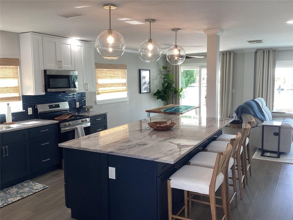 Photo of 11110 1st Street E, Treasure Island, FL 33706 (MLS # TB8553932)