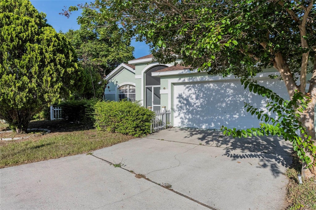 Photo of 611 China Berry Circle, Davenport, FL 33837 (MLS # TB8519632)