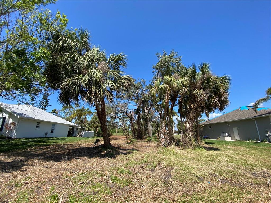 Photo of 45 Long Meadow Place, Rotonda West, FL 33947 (MLS # U8188759)