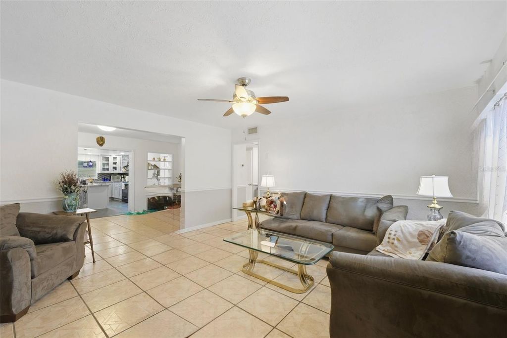 Photo of 319 E 119th Avenue, Tampa, FL 33612 (MLS # TB8430001)