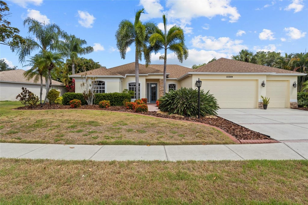 Photo of 12209 Clubhouse Drive, Lakewood Ranch, FL 34202 (MLS # A4697954)
