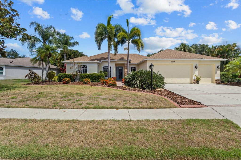 Photo of 12209 Clubhouse Drive, Lakewood Ranch, FL 34202 (MLS # A4697954)