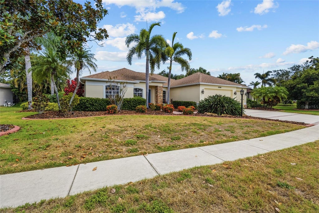 Photo of 12209 Clubhouse Drive, Lakewood Ranch, FL 34202 (MLS # A4697954)